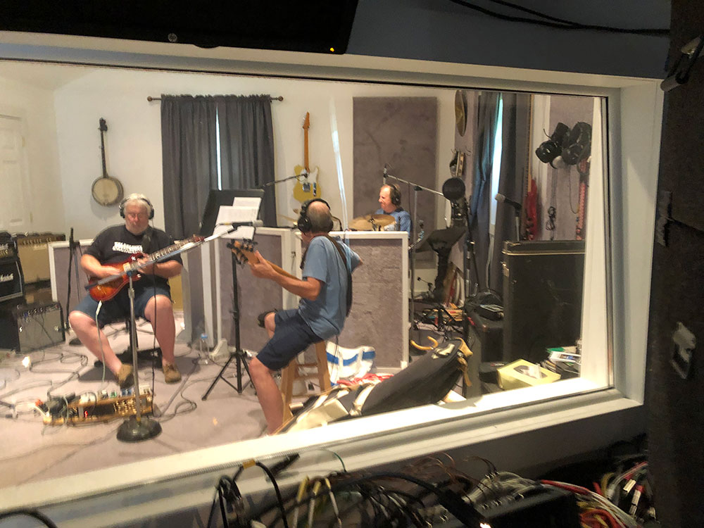 guys jamming out in studio